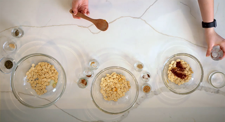 Pumpkin Seeds in glass bowls .