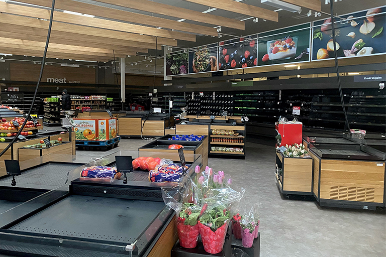 Empty shelves at a grocery store.