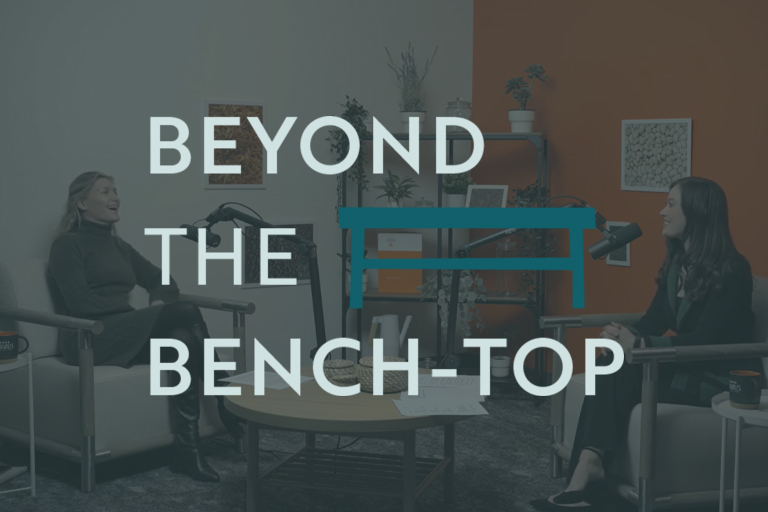 Beyond the bench-top is an image of a St. Charles podcast video.