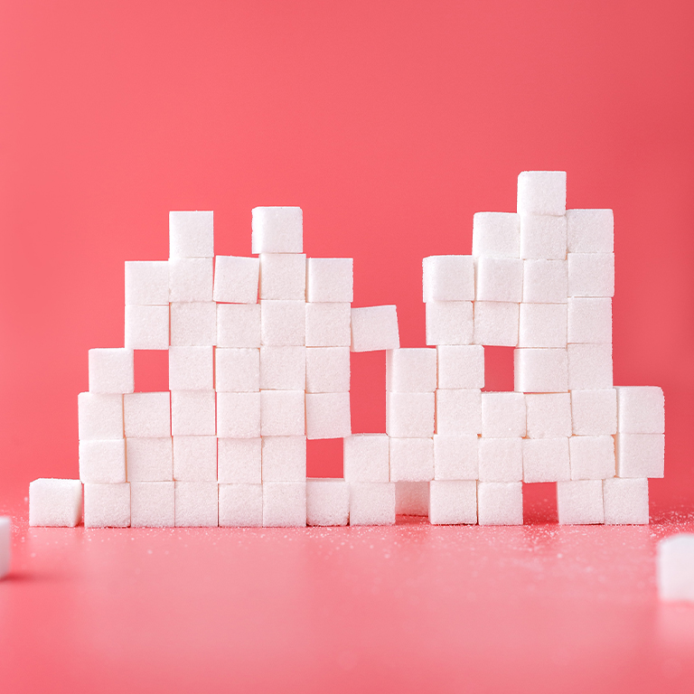 Sugar cubes arranged in rows