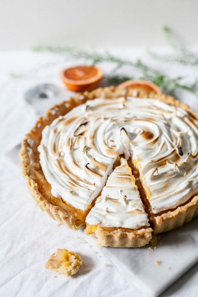 Pie topped with delicious frosting.