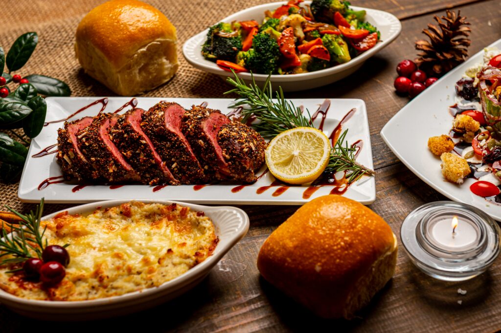 Delicious thanksgiving dishes gathered around a table.