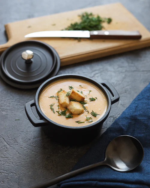 Tiny bowl of creamy soup.