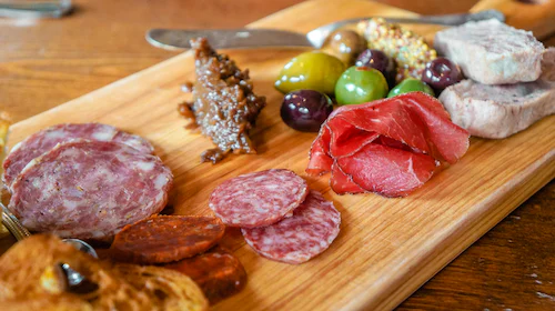 Chacuterie board with meats and cheeses.