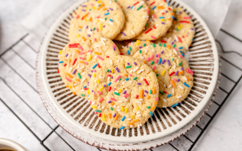 cane sugar cookies with sprinkles on a plate