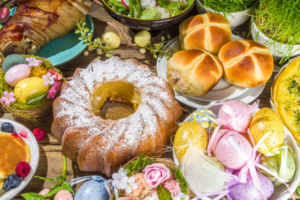 All types of Easter food - breads and sweets surrounded by one another.