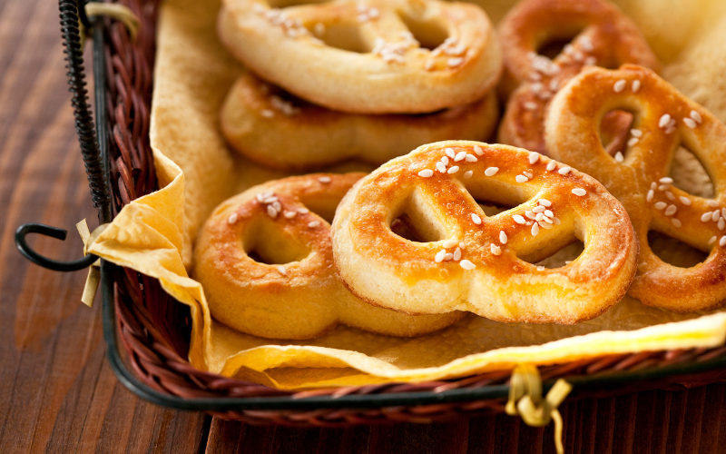 Soft salty pretzels laying in a basket
