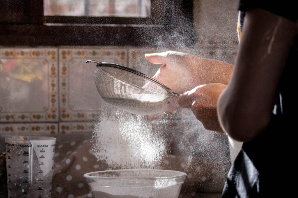 wheat flour powder rising into the air.