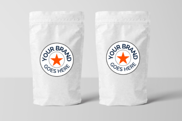 A photo of two plain bags with a temporary logo on the front.
