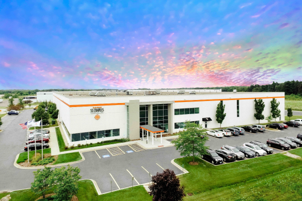 St. Charles Trading headquarters with a colorful sky.
