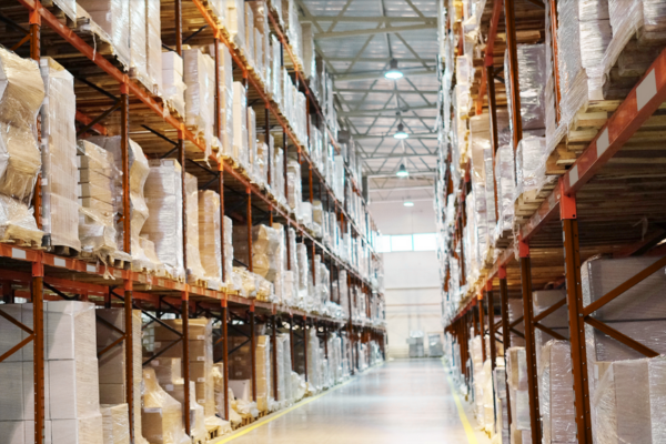A photo of a warehouse with lots of boxes.