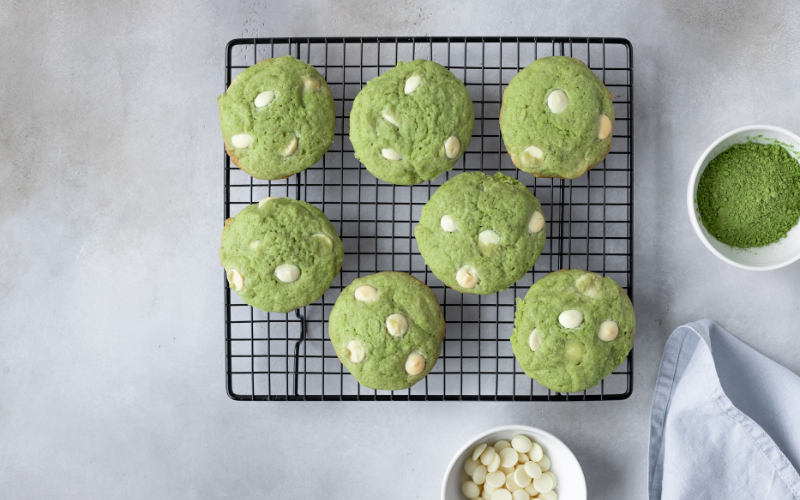 Six matcha sesame cookies on a cooling rack