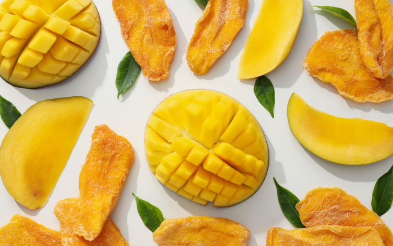 An assortment of freeze-dried pineapple on a white counter