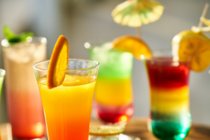 Several beverages of varying colors and flavors, showcasing premium beverage ingredients