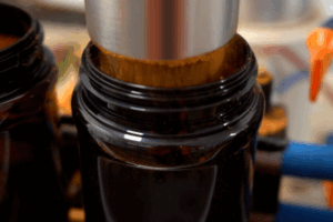 Our automated machine filling a shaker with an ingredient blend