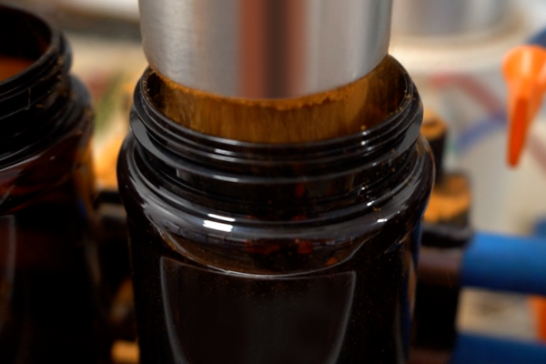 Our automated machine filling a shaker with an ingredient blend